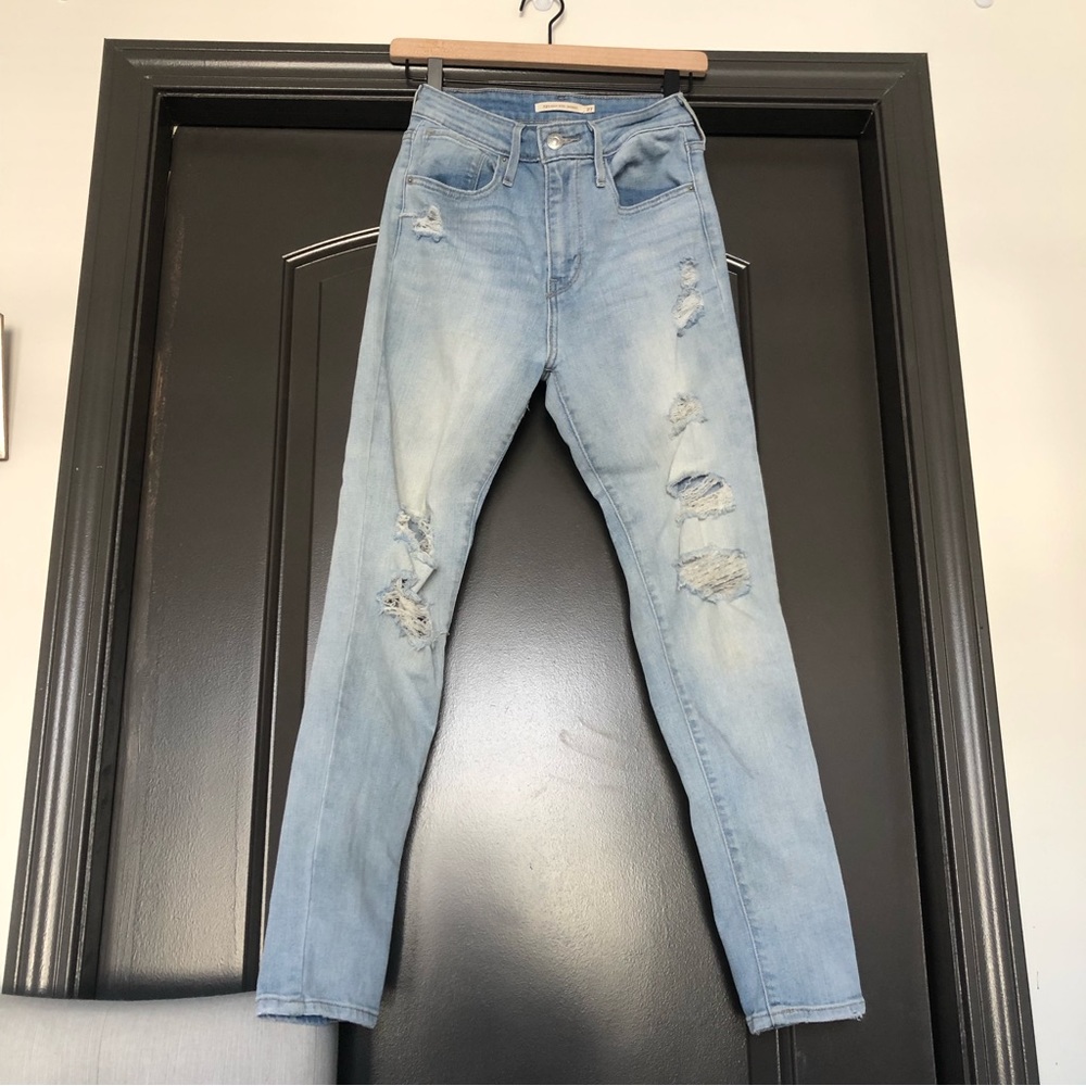 Levi & Strauss Co 721 light wash distressed high rise skinny Jean